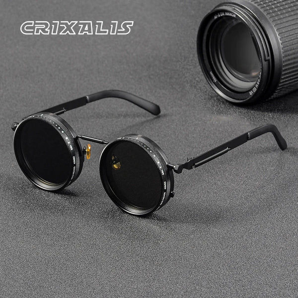 A pair of black polarized adjustable dimming sunglasses resting on a dark gray surface with a lens visible.