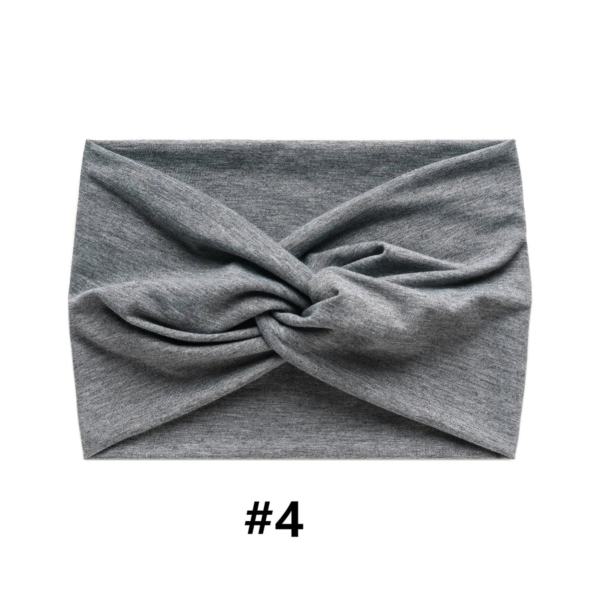 A gray fabric headband tied in a knot, suitable for bohemian style.
