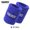 A pair of royal blue knitted sport wristbands for activewear