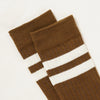 Brown cotton knee high socks with white stripes