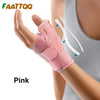 Pink flexible thumb splint wrist brace worn on a hand for joint support.
