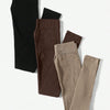 A set of three seamless high-waisted yoga leggings in black, brown, and beige.