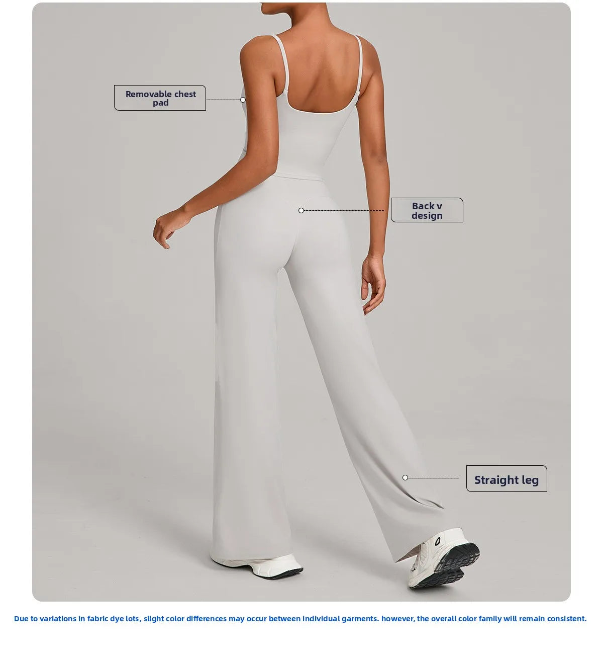 A woman models a light gray high-waist yoga and fitness tracksuit set featuring a removable chest pad and a back V design.