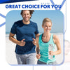 A man and a woman smiling while holding a collapsible silicone travel water bottle outdoors.