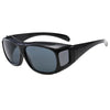 Black night vision driving sunglasses with a dark gray lens and a flexible arm.