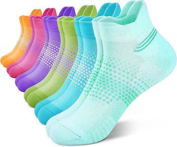 A variety of colorful breathable mesh ankle socks are displayed in a row.