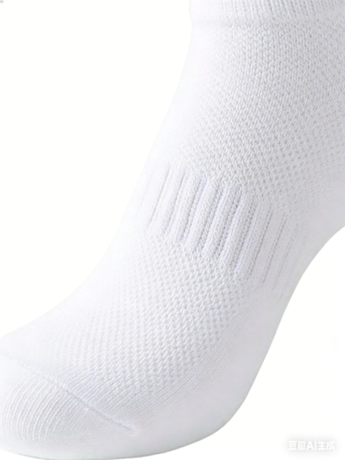 A close-up view of a white, knitted ankle sock.