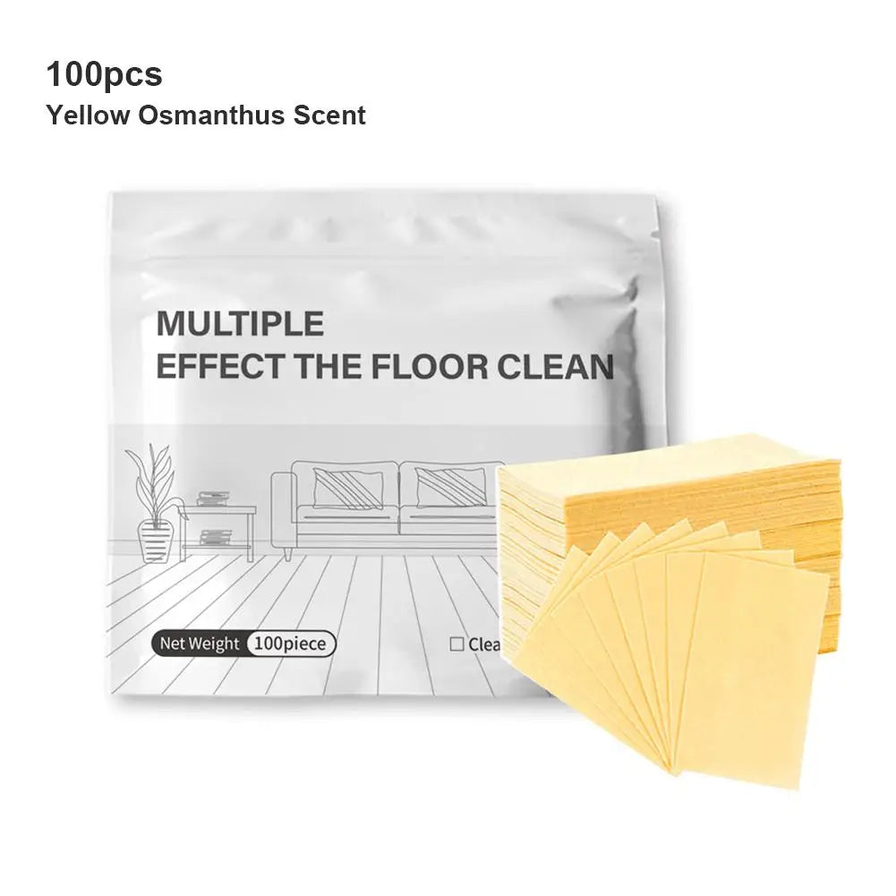 A package of yellow Osmanthus scent floor cleaning tablets and a stack of yellow cleaning sheets.