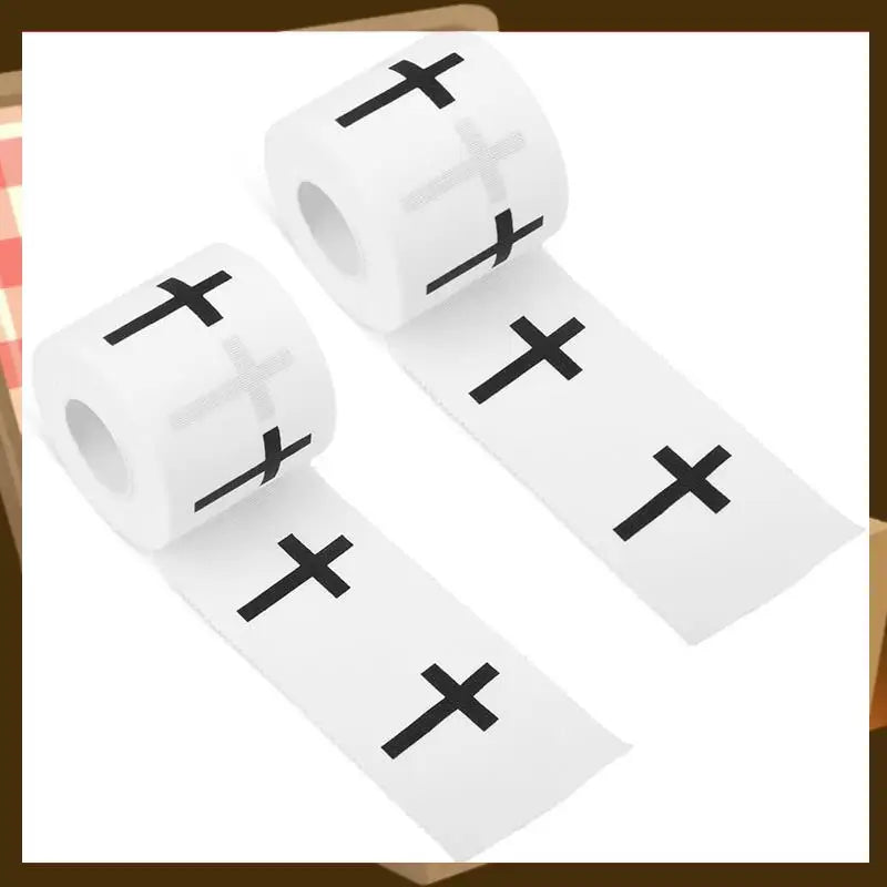 Rolls of white athletic tape with black crosses for sport and support