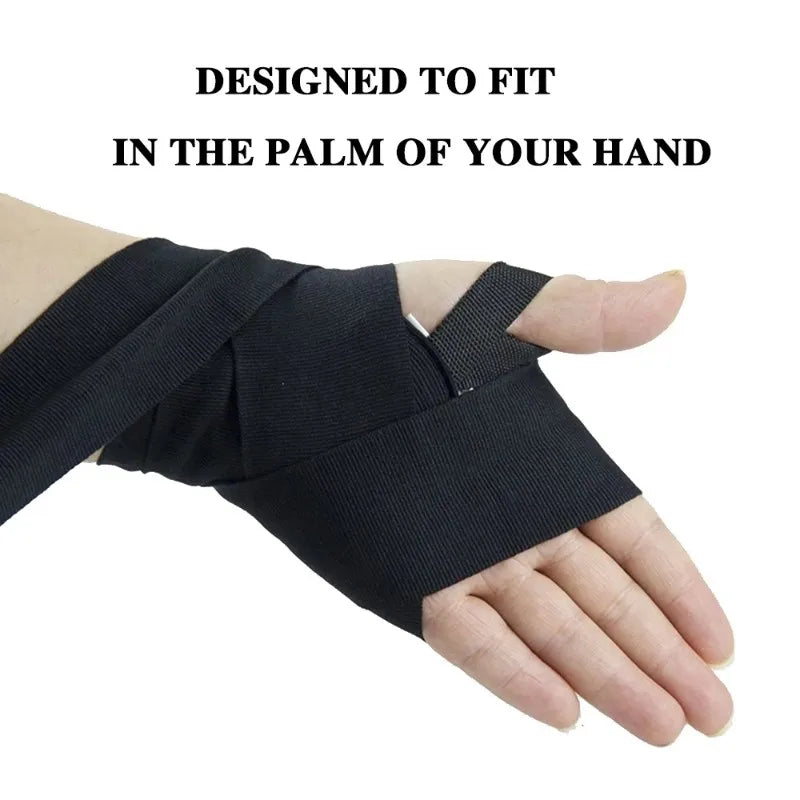 Black boxing hand wraps being shown on a person's palm.