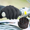Close-up of a hand wearing black motorcycle riding gloves with red stitching detail.