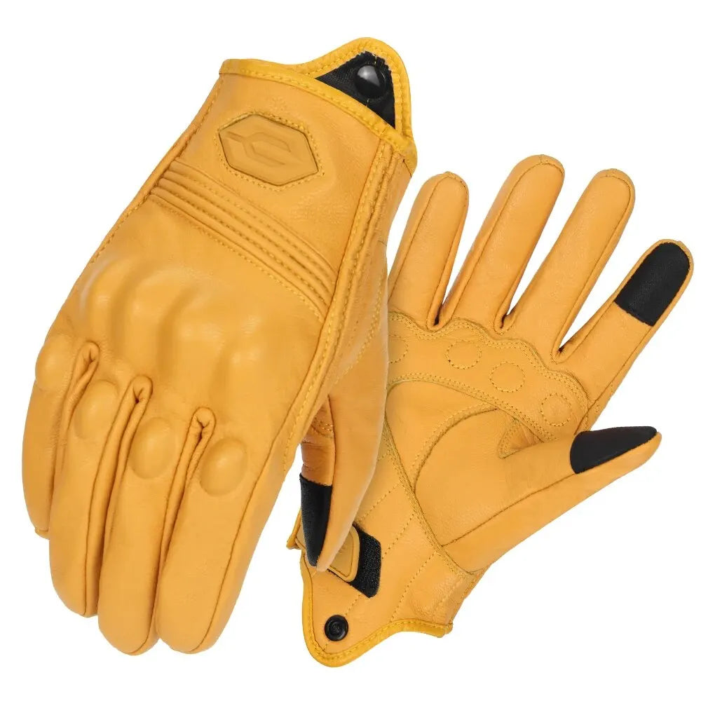 A pair of tan vintage leather motorcycle riding gloves shown flat.