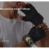 A hand wearing a black protective glove is shown against a light gray background, emphasizing palm protection for weightlifti