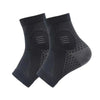 A pair of black therapeutic compression socks for foot and ankle pain relief.