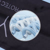 A circular graphic showing light blue, wavy fabric texture resembling breathable arm sleeves.