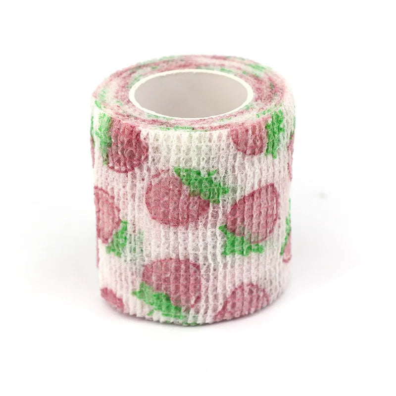 Roll of pink and green fruit pattern elastic bandage tape for joints