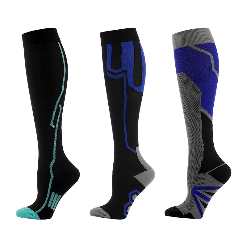 Three pairs of compression socks in black with blue and gray accents shown vertically.
