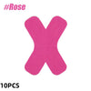 A set of ten pink kinesiology tape strips shaped like the letter X for joint support.