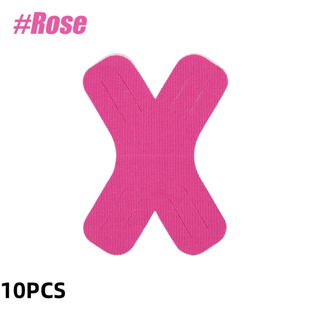 A set of ten pink kinesiology tape strips shaped like the letter X for joint support.
