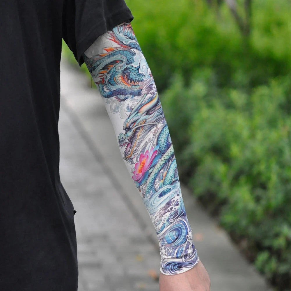 Close-up of a person wearing an ice silk tattoo sleeve featuring colorful, swirling dragon designs on their arm.