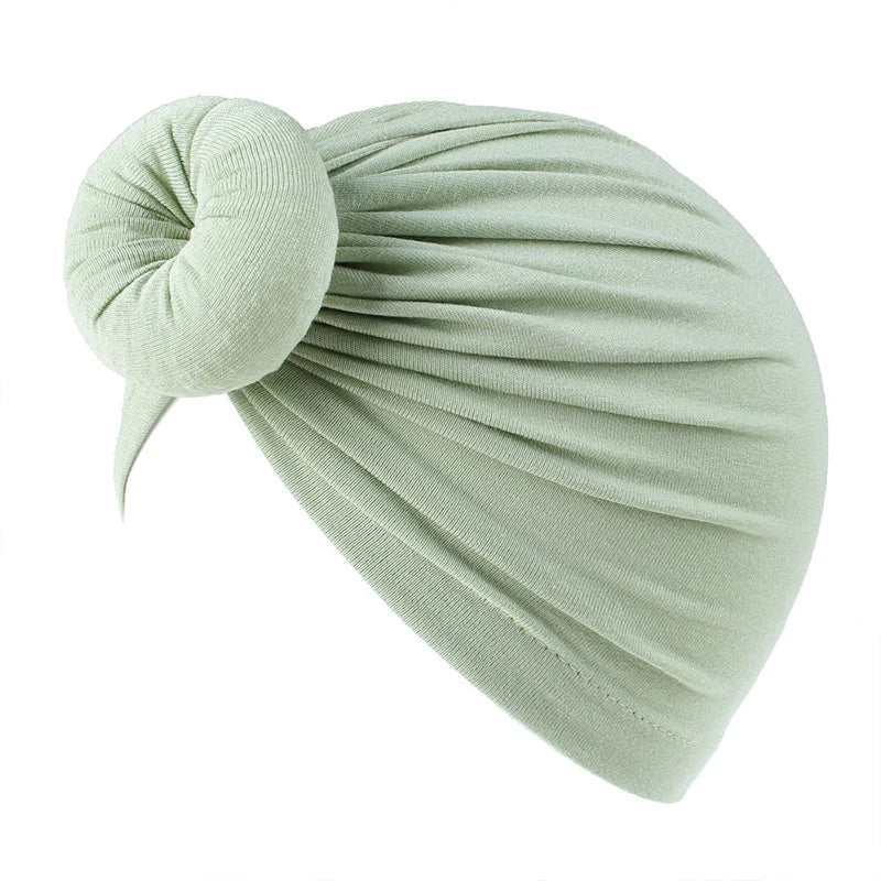 Helles salbei-grünes, durchgehendes Baumwollbaby-Turban für Säuglinge.