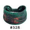 A dark green patterned fabric headband tied in a bow, suitable for yoga or workout.