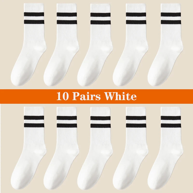 Ten pairs of white breathable cotton sport socks displayed in a flat lay arrangement.