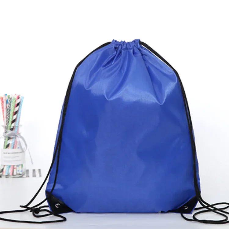 A bright blue drawstring storage bag with black trim, shown against a white background.
