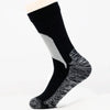 Black and gray waterproof breathable hiking socks shown on a foot.