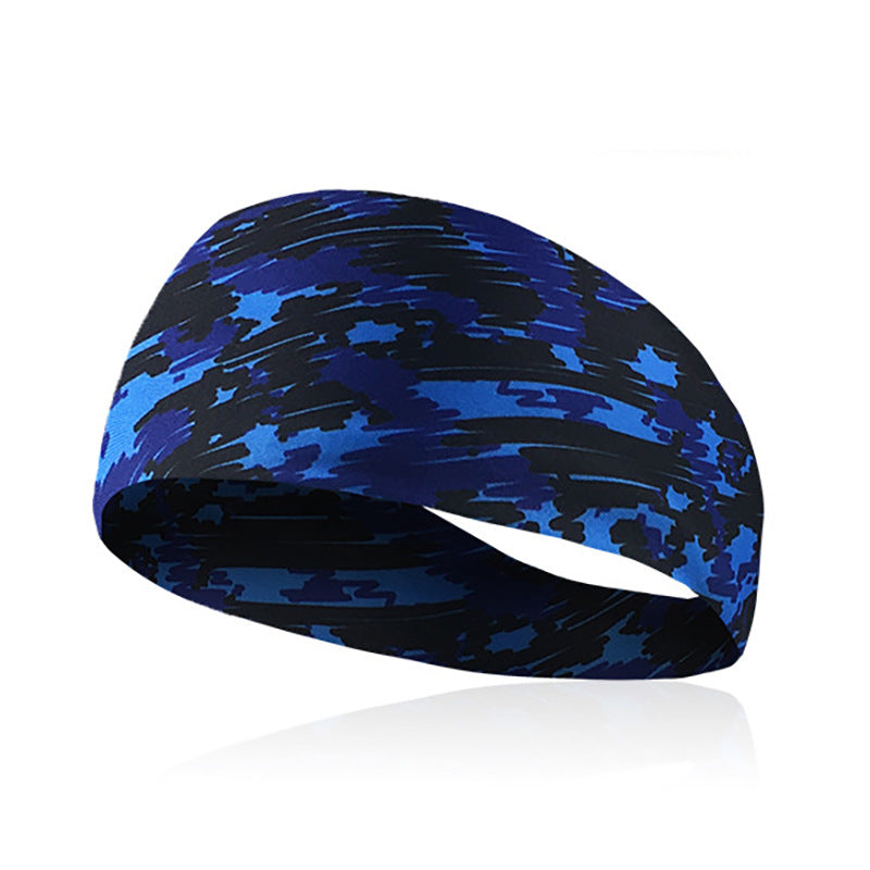 A dark blue and black camouflage patterned elastic sports headband shown on a wrist.