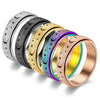 A collection of stainless steel spinning rings featuring various textures and moon and star designs.