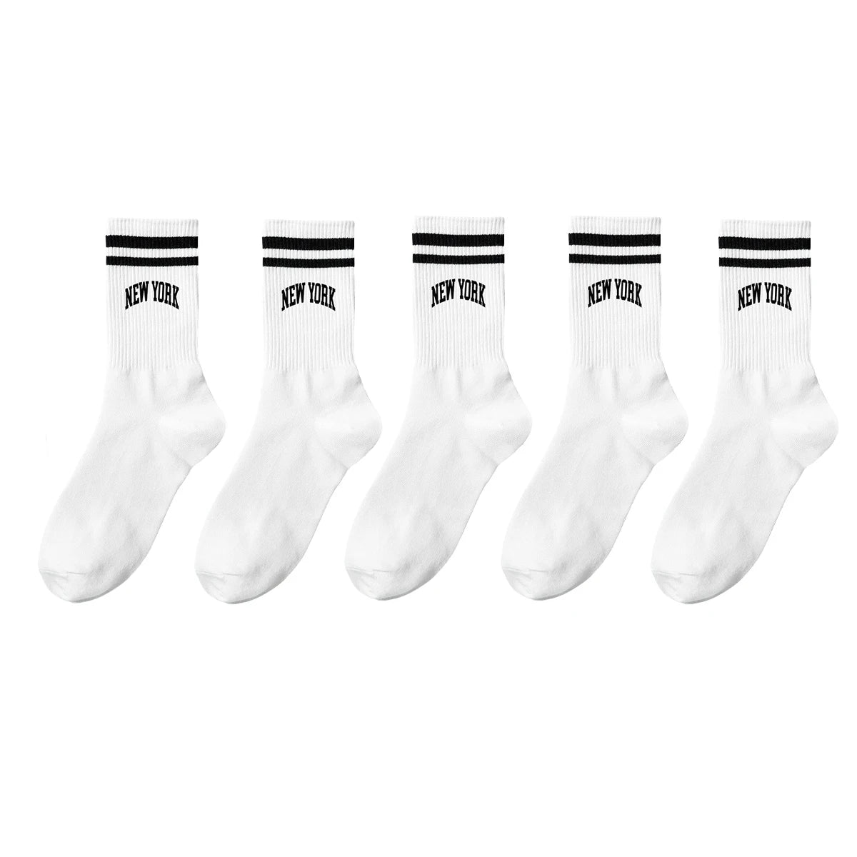 A set of white crew socks with black stripes and New York lettering.