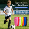 A boy is running on a field with hexagonal honeycombed calf protection shin guards and a soccer ball visible.