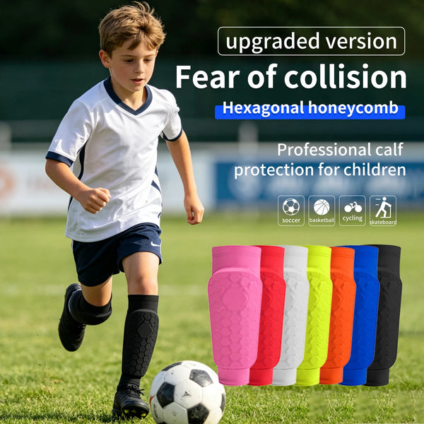A boy is running on a field with hexagonal honeycombed calf protection shin guards and a soccer ball visible.