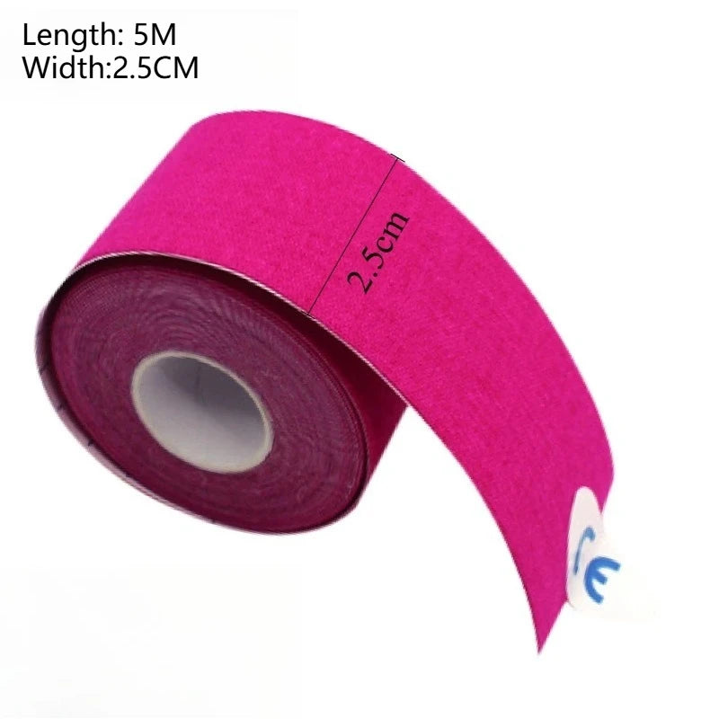 Roll of bright pink kinesiology tape with a 2.5cm width shown from the side.