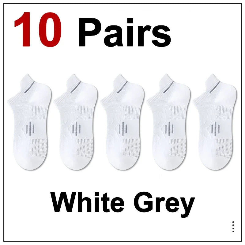 Ten pairs of white grey premium breathable men's running socks displayed side by side.