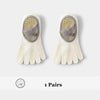 A pair of beige five-finger yoga and fitness socks with a patterned design on the top