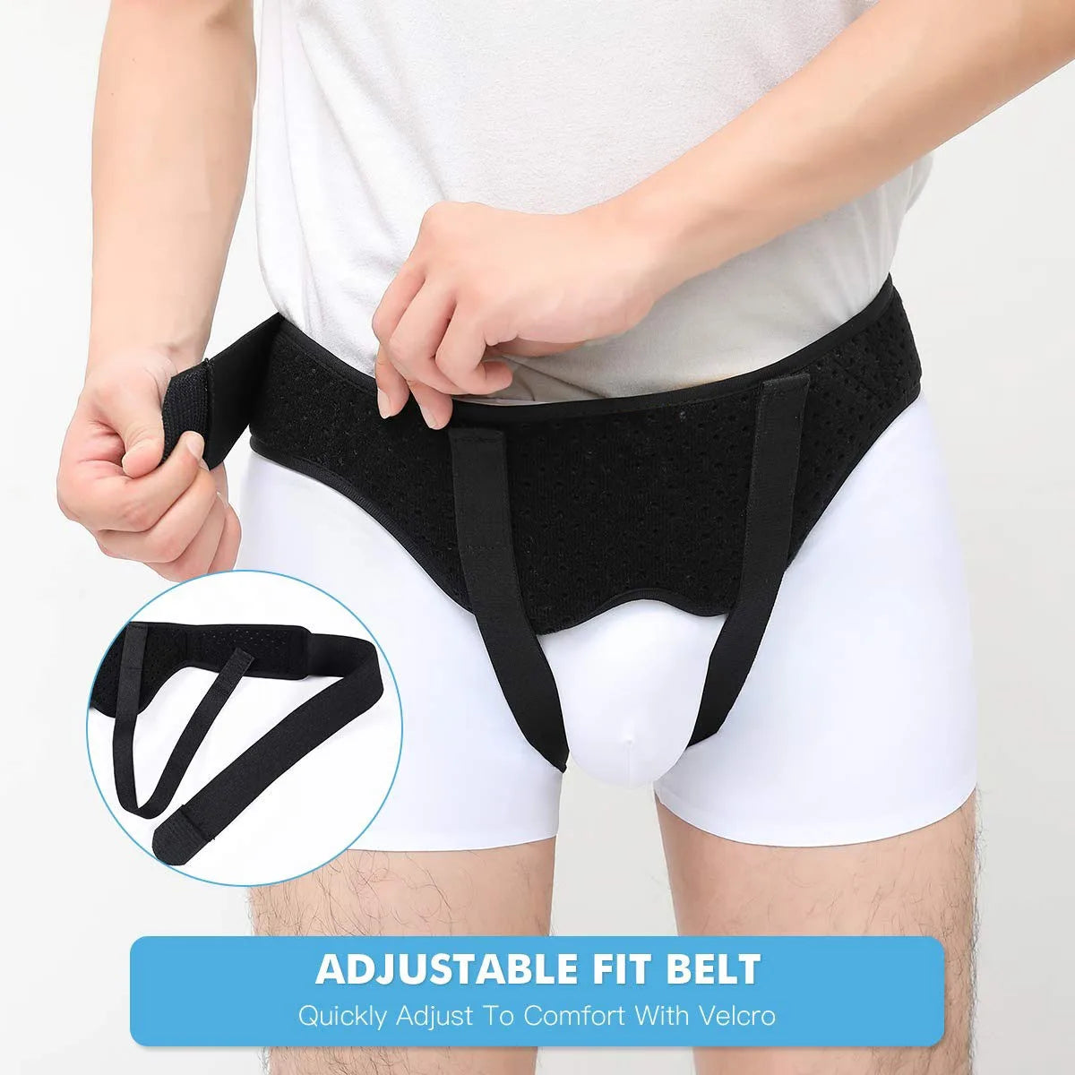 A person is adjusting a black adjustable fit belt for hernia support using Velcro.