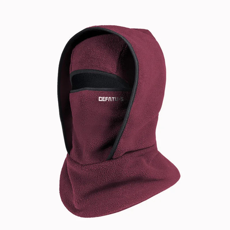 A maroon double-layer winter beanie with a black trim and a visible brand label.