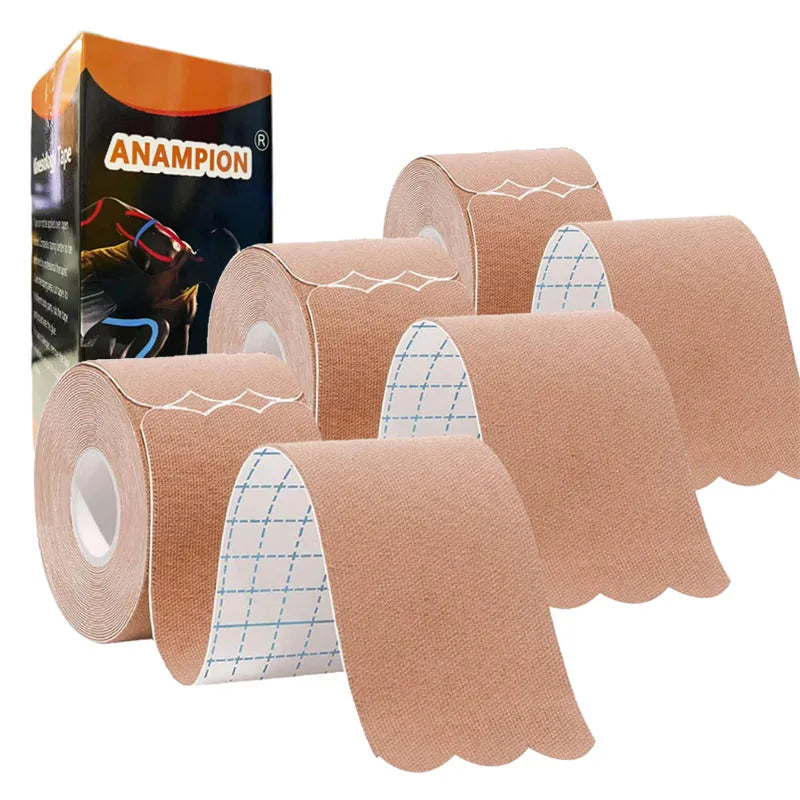 Rolls of tan kinesiology tape for joint and muscle support next to its packaging box