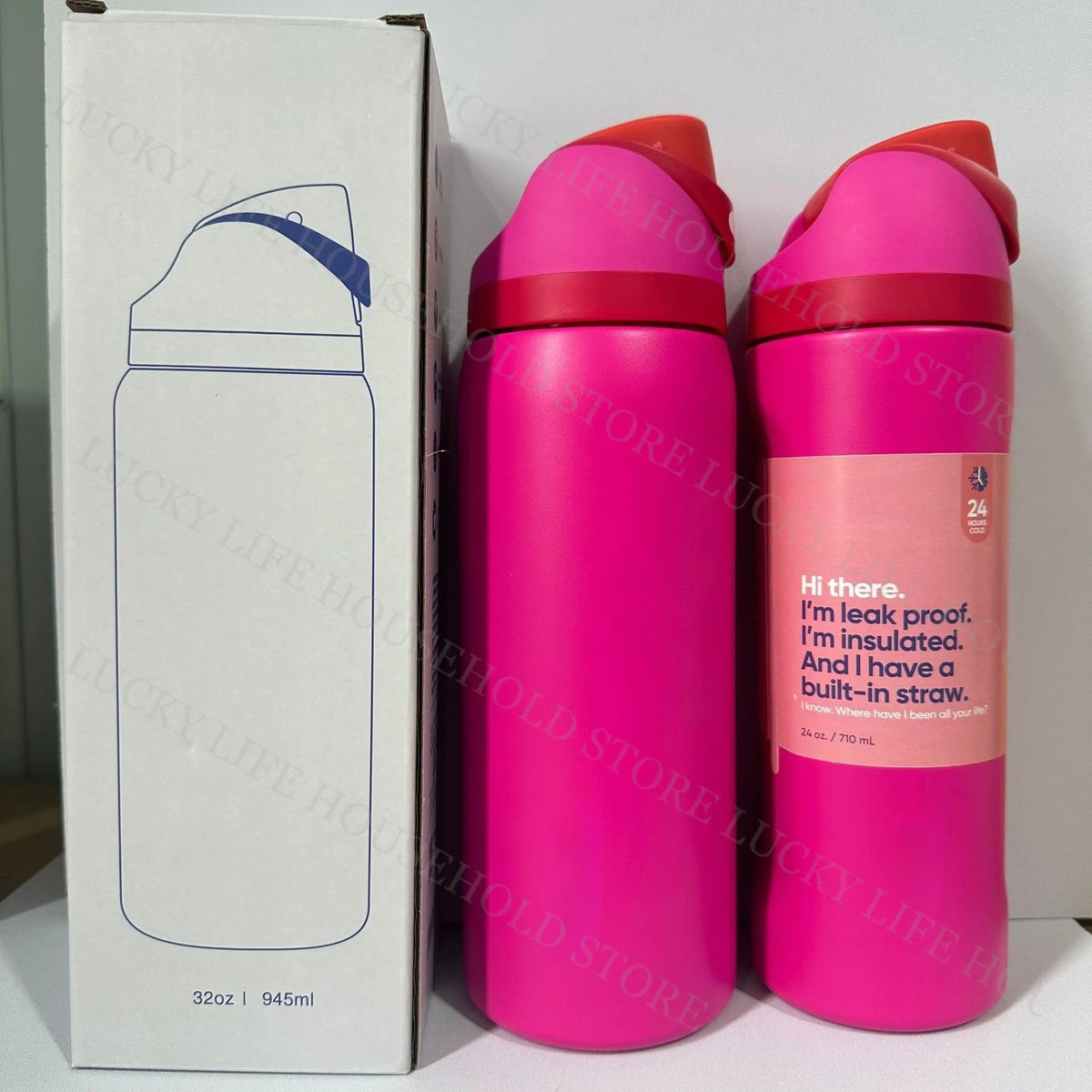 A pink insulated sports water bottle with a red cap and label on a white box.