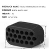 Black silicone facial training masseter ball with holes, shown from the side.