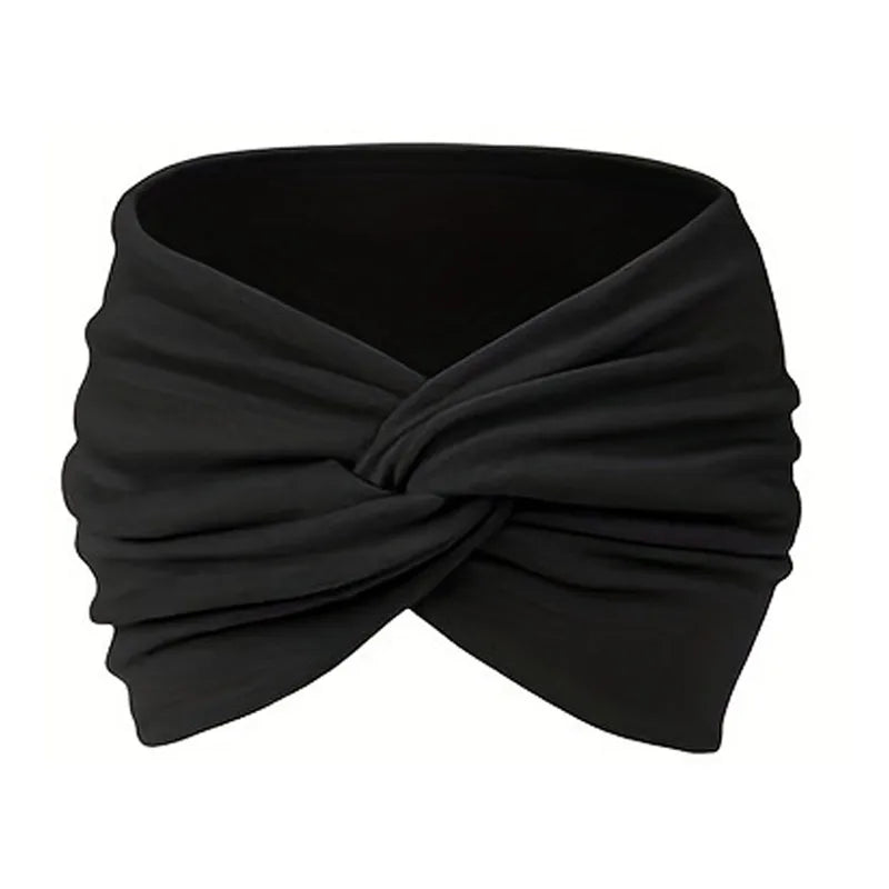 Diadema de tela negra atada en un nudo para peinar el cabello