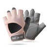 A pair of light pink and gray half finger sports gloves for weight lifting and exercise