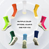 A variety of multi-color silicone grip socks displayed in a circular arrangement.