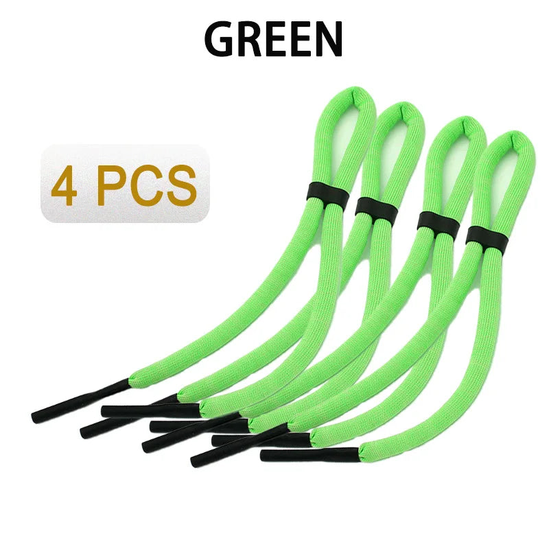Four bright green floating eyewear straps for water sports
