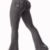 A woman wearing gray high stretch yoga leggings with a front pocket and a side seam detail.
