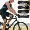A man rides a bicycle while wearing kinesiology tape for joint support and sports injury recovery.