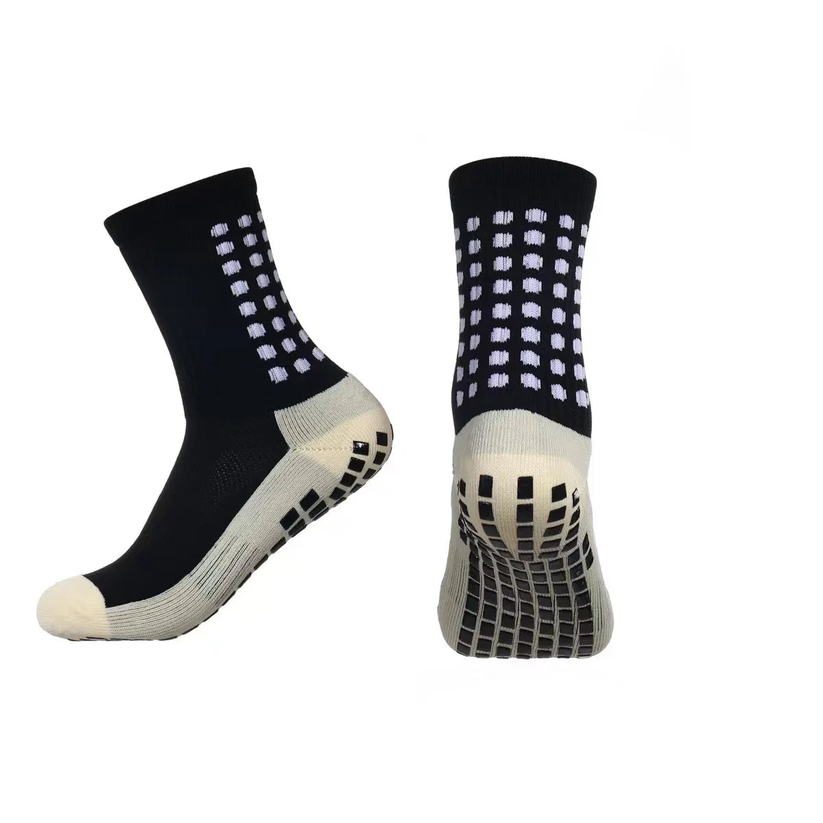A pair of black silicone grip socks with white patterned accents and a beige sole.