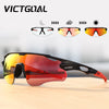 A pair of orange photochromic sports sunglasses resting on a wooden surface, shown alongside different tint options.